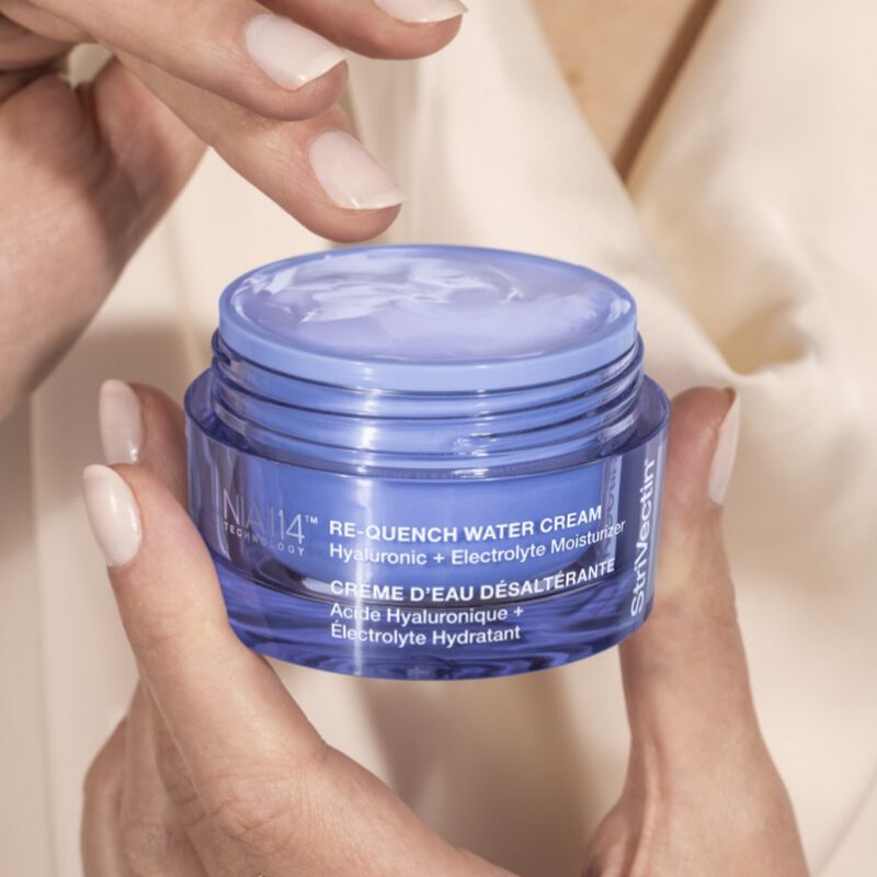 Re-Quench Water Cream Hyaluronic + Electrolyte Moisturizer in hands